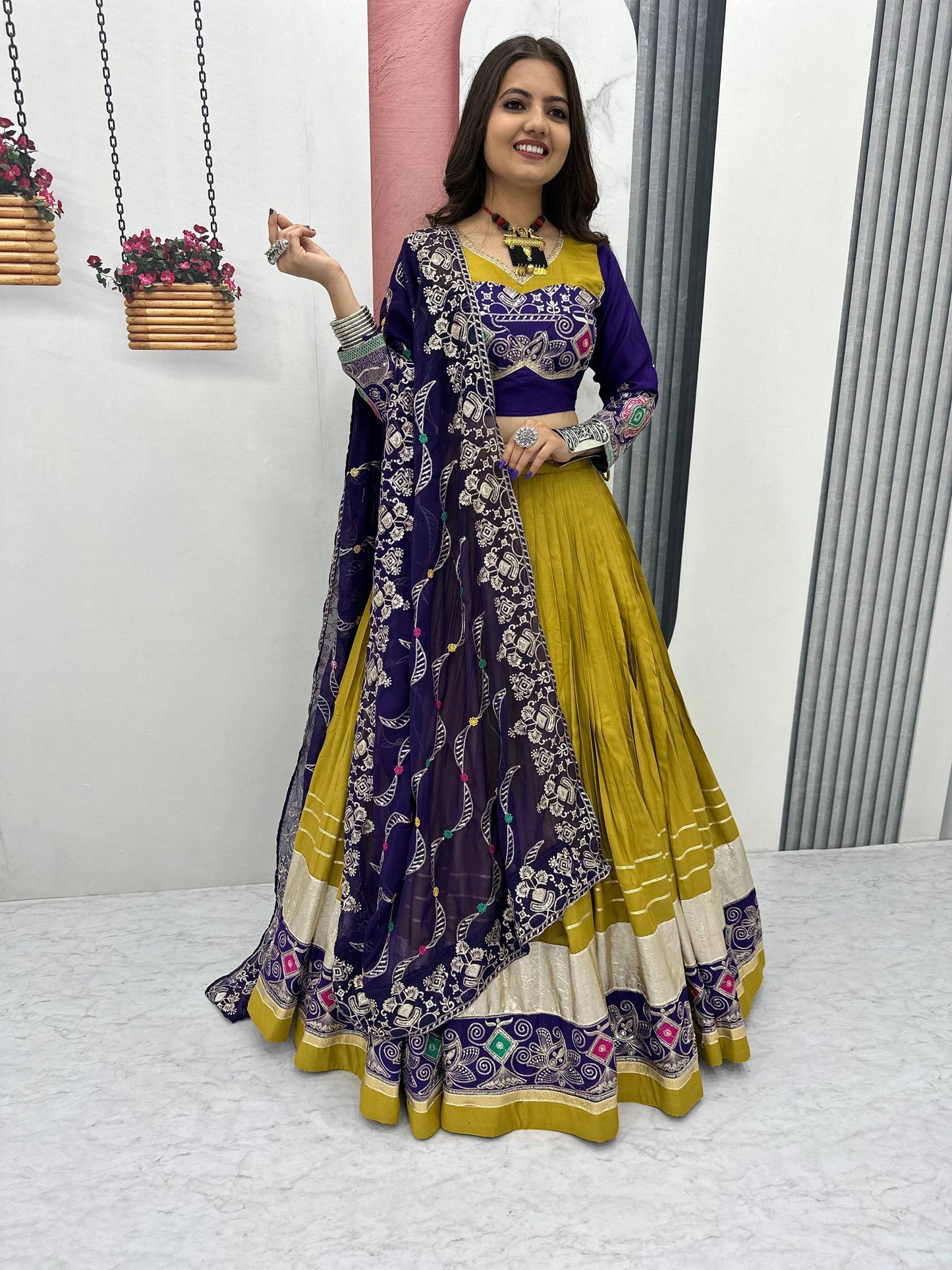 The Festival Muse Jewel Tones with Hand Embroidered Borders Navratri Lehenga Choli