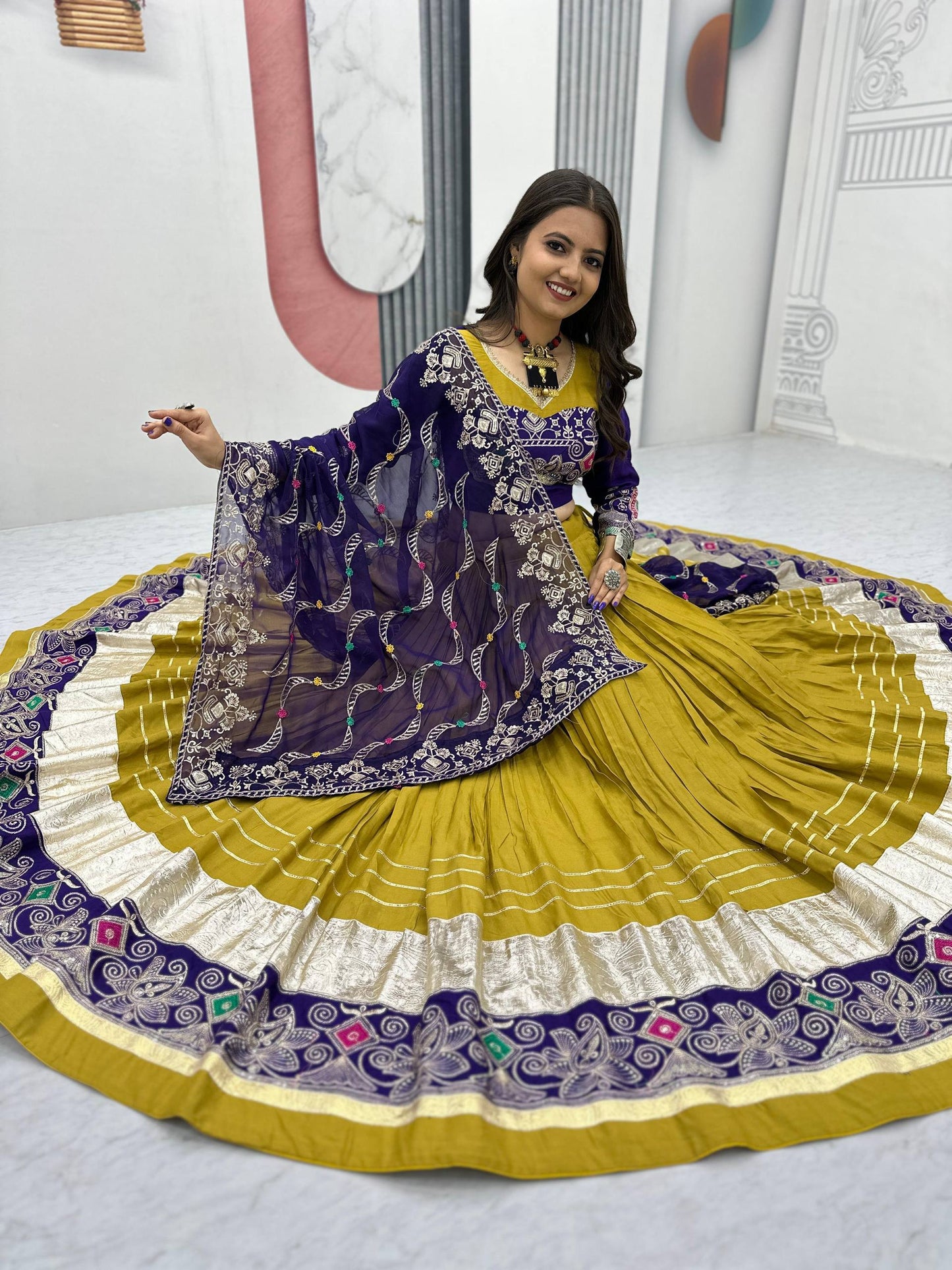 The Festival Muse Jewel Tones with Hand Embroidered Borders Navratri Lehenga Choli