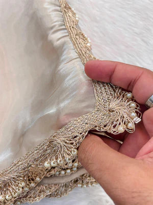 Jenisha Glamorous Jimichu tissue Saree with Pearl Dori Lace