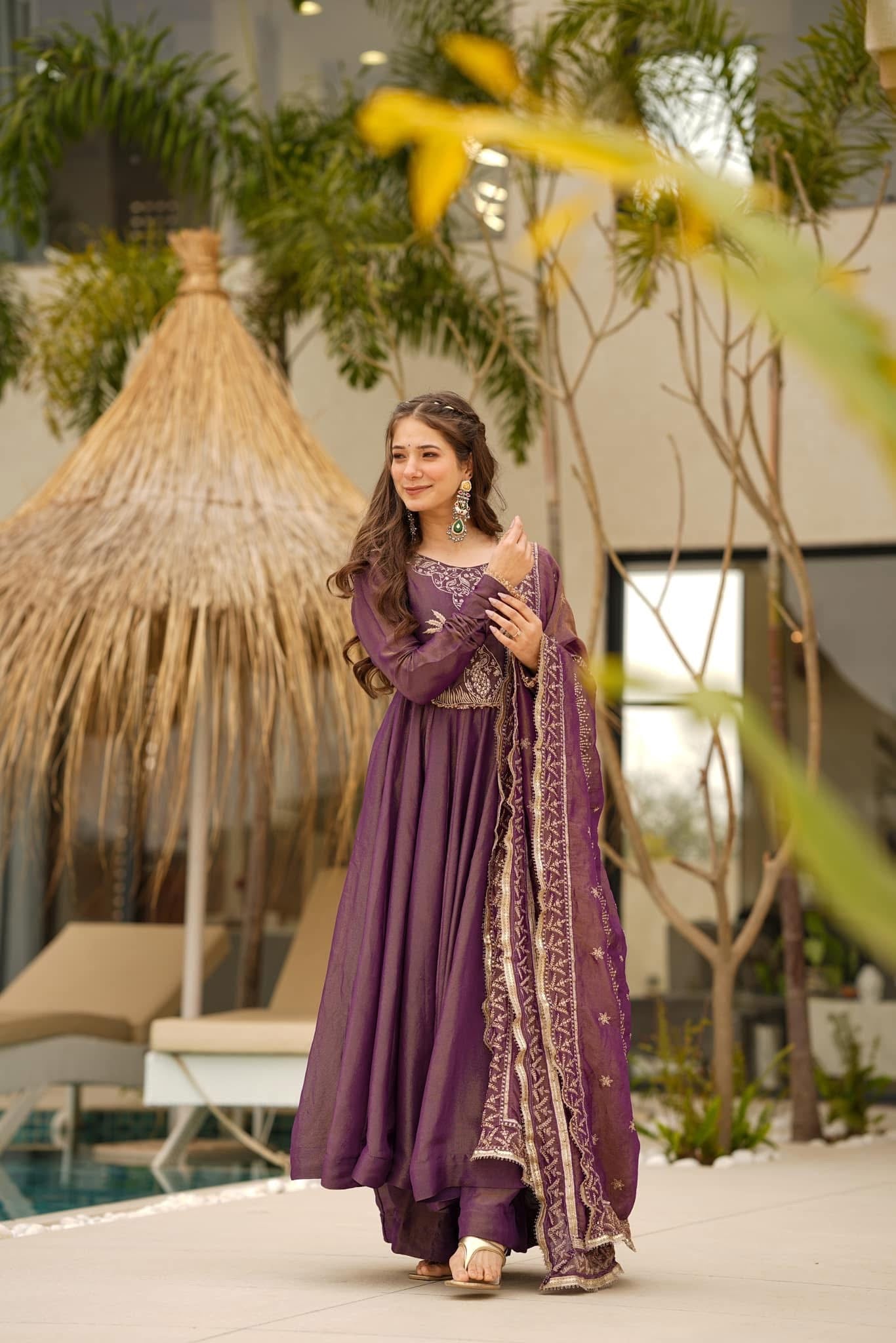 Elegance in Amethyst: Graceful Charm in Traditional Wear
