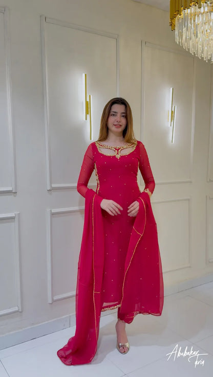 Solid Pink Long Hand Embellshed Kurta With Trouser And Dupatta