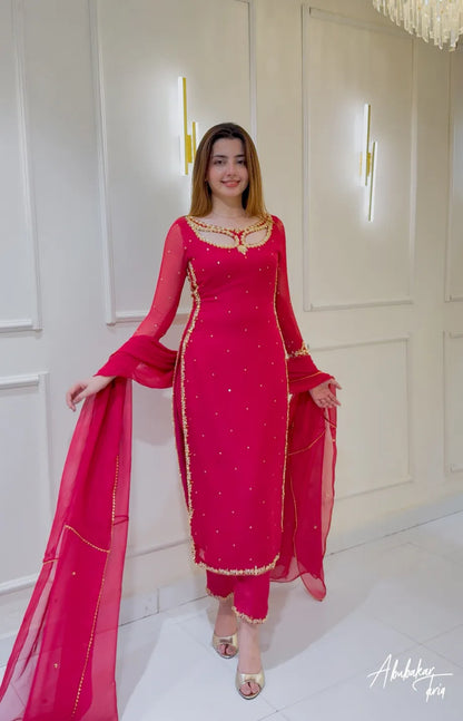 Solid Pink Long Hand Embellshed Kurta With Trouser And Dupatta
