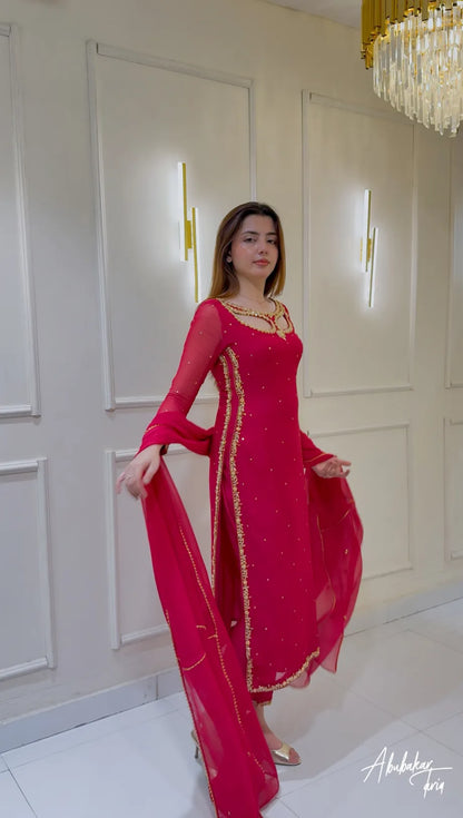 Solid Pink Long Hand Embellshed Kurta With Trouser And Dupatta