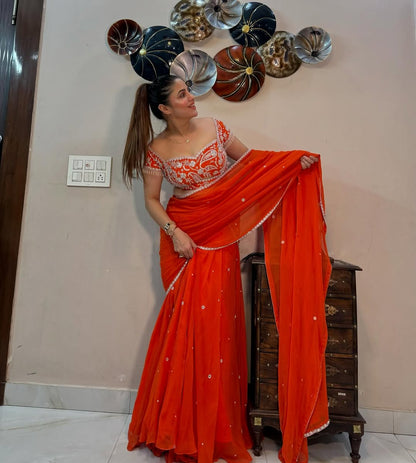 Glamorous Orange Embroidered Lehenga Saree