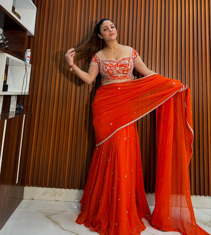 Glamorous Orange Embroidered Lehenga Saree