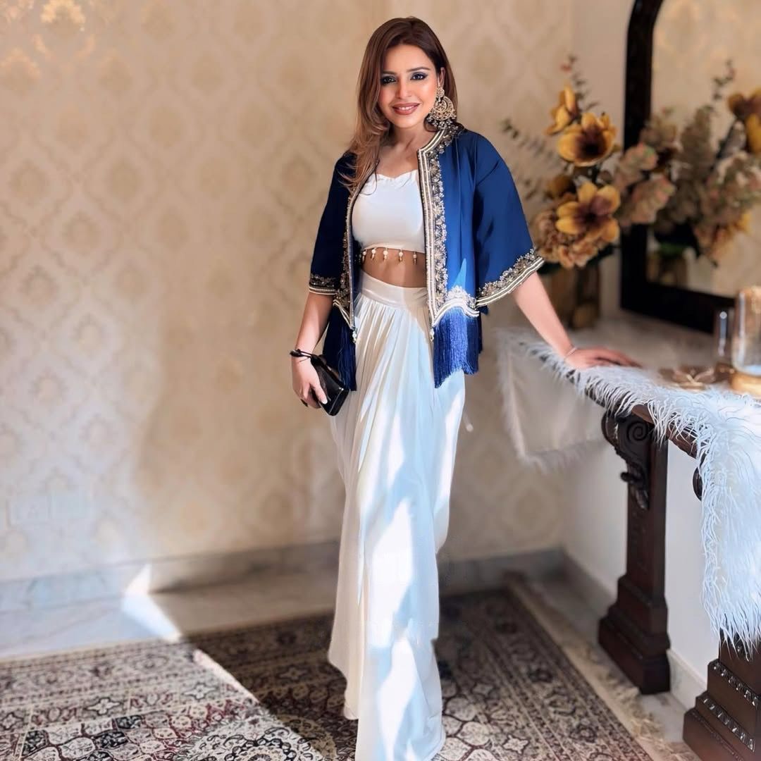 A Queen's Bold Blues and Flowing Whites Three Piece Indo western