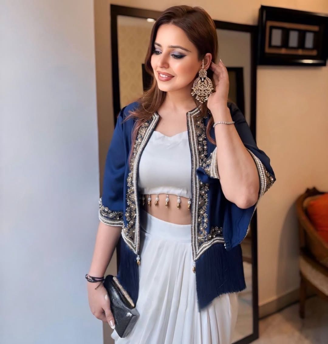 A Queen's Bold Blues and Flowing Whites Three Piece Indo western