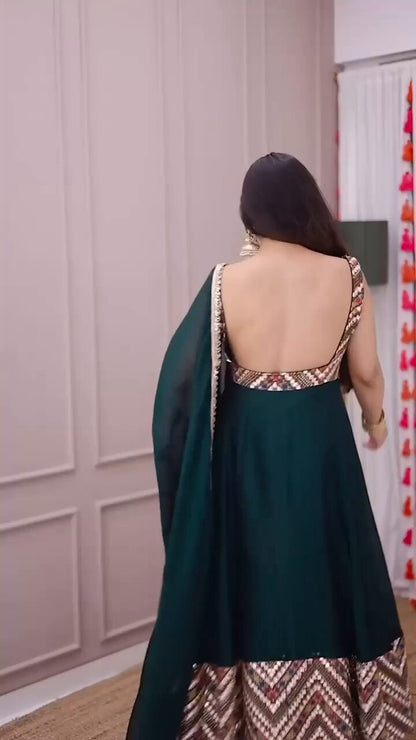 Nirva Designer Heavy Fux Georgette Sequins Zari Embroidery Gown