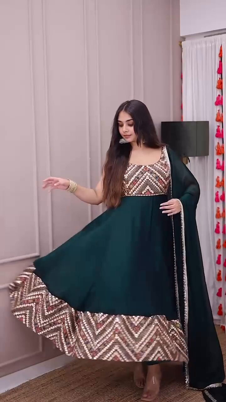 Nirva Designer Heavy Fux Georgette Sequins Zari Embroidery Gown