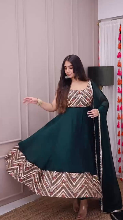 Nirva Designer Heavy Fux Georgette Sequins Zari Embroidery Gown