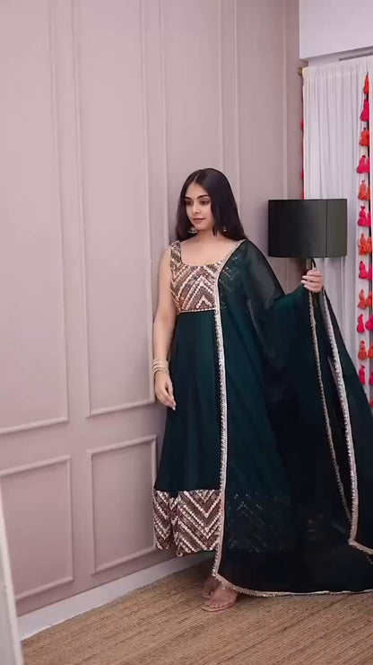 Nirva Designer Heavy Fux Georgette Sequins Zari Embroidery Gown