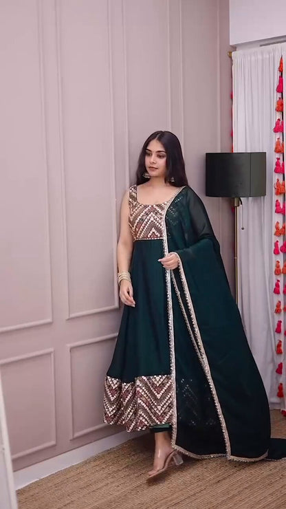 Nirva Designer Heavy Fux Georgette Sequins Zari Embroidery Gown