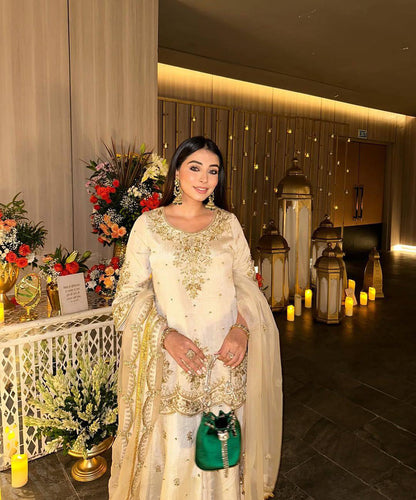 Naira Elegant Ivory Gold Handcrafted Plazoo Suit
