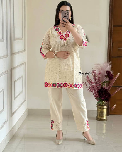 Ivory Charm Mirror-Thread Kurta Set with Vibrant Geometric Accents