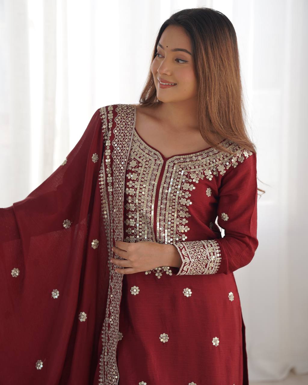 A Symphony of Ethnic Elegance Maroon And White  Shararas