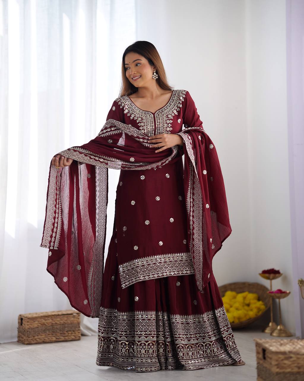 A Symphony of Ethnic Elegance Maroon And White  Shararas