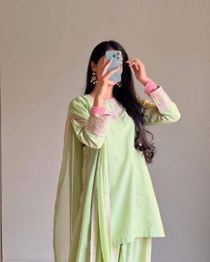 Ivory Whisper: Soft Elegance in Hand-Embroidered Pastel Pink Threads