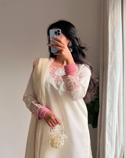 Ivory Whisper: Soft Elegance in Hand-Embroidered Pastel Pink Threads