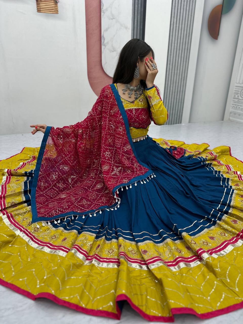 this lehenga is made for the queen of the garba floor.